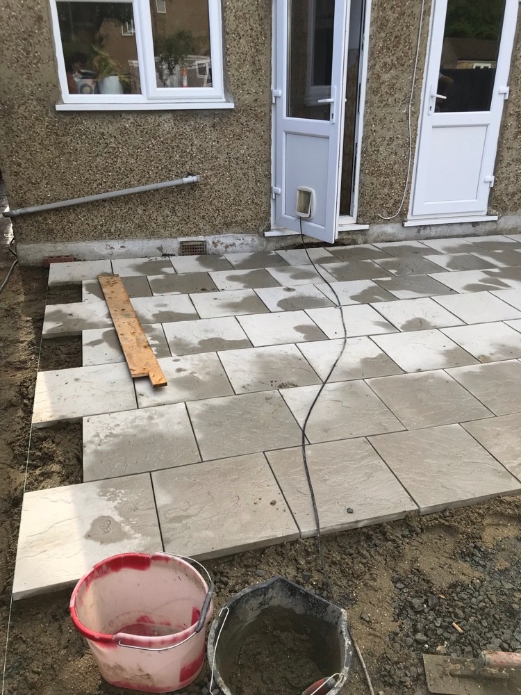 New paving slab patio laid by Brandals