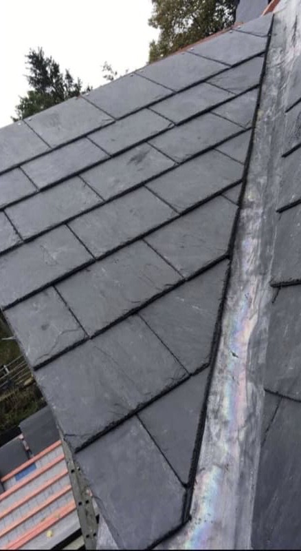 New natural slate roof with lead valley by Brandals